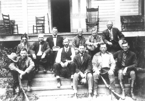 Hunters on the
                  steps of Tippah Lodge