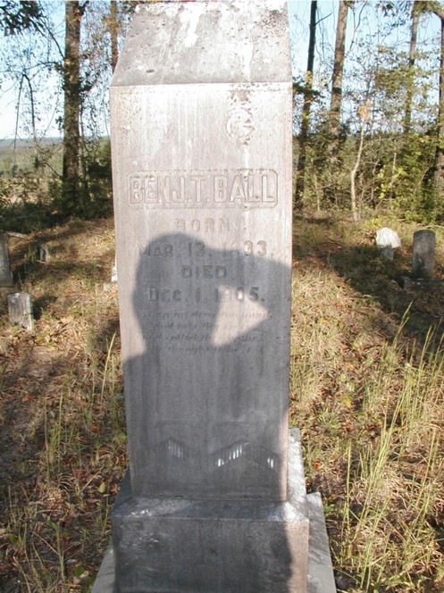 Benj. Ball tombstone w/ Michael Caviness shading the area for photograph.